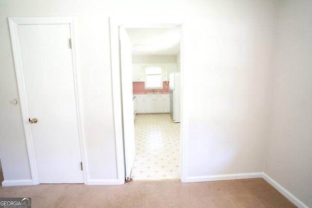 5530 Perry Ave, Columbus, GA 31909 - corridor with light colored carpet and light floors
