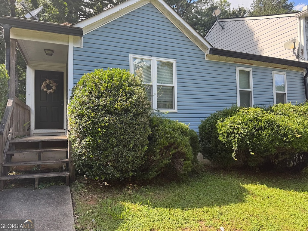 4059 Heritage Valley Ct, Norcross, GA 30093 - doorway to property featuring a yard