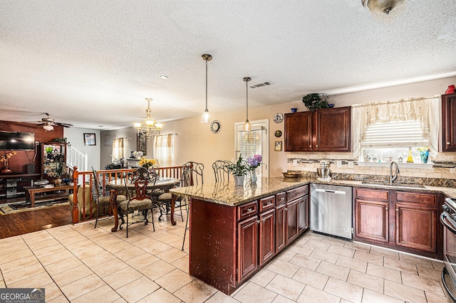 11961 Markham Way, Hampton, GA 30228 - kitchen with stainless steel appliances, a textured ceiling, ceiling fan, a peninsula, and light tile patterned flooring