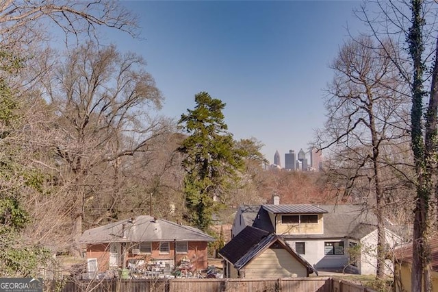 469 Mellview Ave, Atlanta, GA 30310 - rear view of property with a standing seam roof, a metal roof, and a chimney