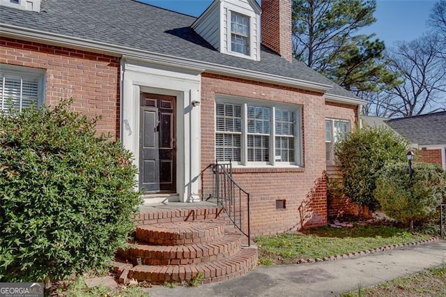 469 Mellview Ave, Atlanta, GA 30310 - property entrance featuring brick siding, a chimney, a shingled roof, and crawl space
