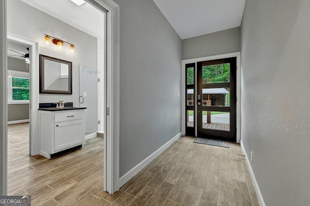 67 Mcnelley Dr, Morganton, GA 30560 - foyer featuring light wood finished floors and plenty of natural light