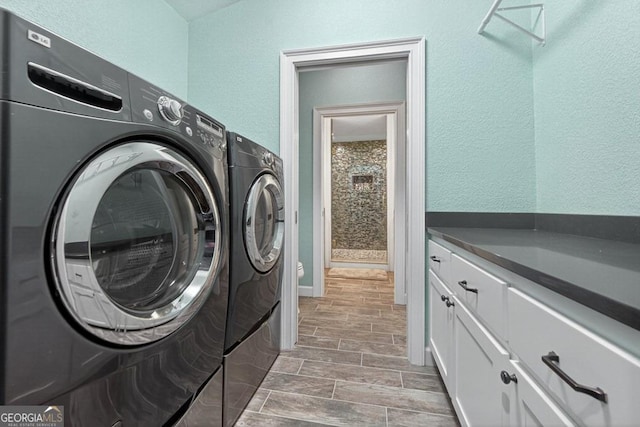 67 Mcnelley Dr, Morganton, GA 30560 - washroom with washing machine and dryer and cabinet space