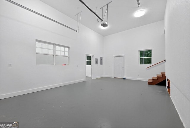 67 Mcnelley Dr, Morganton, GA 30560 - garage featuring baseboards and a garage door opener