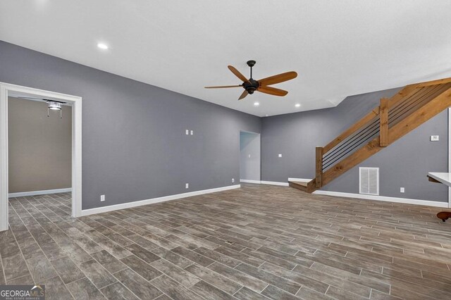 67 Mcnelley Dr, Morganton, GA 30560 - unfurnished living room with ceiling fan, wood finished floors, stairs, and recessed lighting