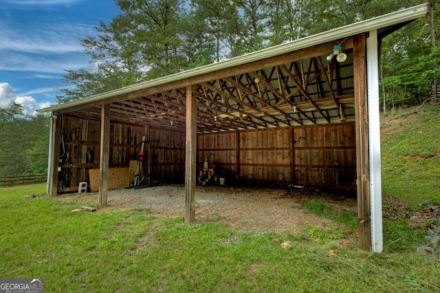 67 Mcnelley Dr, Morganton, GA 30560 - view of vehicle parking with a carport and an outbuilding