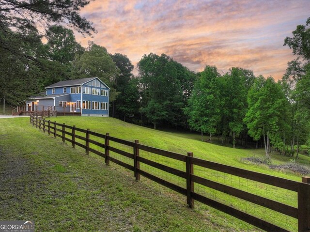 67 Mcnelley Dr, Morganton, GA 30560 - yard at dusk with a wooden deck