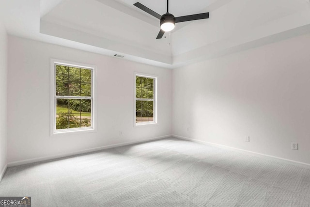 5560 Pilgrim Point Ext, Cumming, GA 30041 - carpeted empty room featuring a tray ceiling and ceiling fan