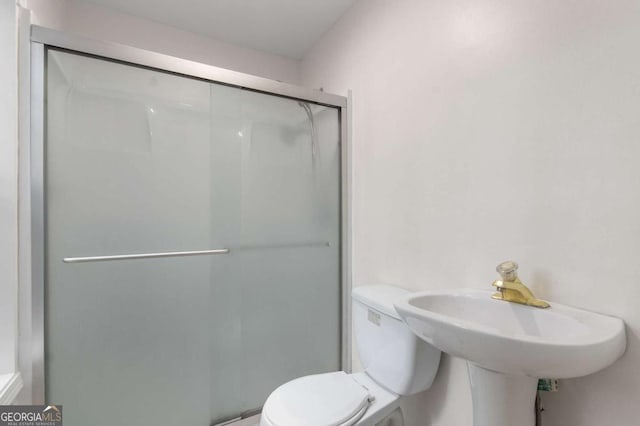 5560 Pilgrim Point Ext, Cumming, GA 30041 - full bathroom featuring toilet and a shower stall