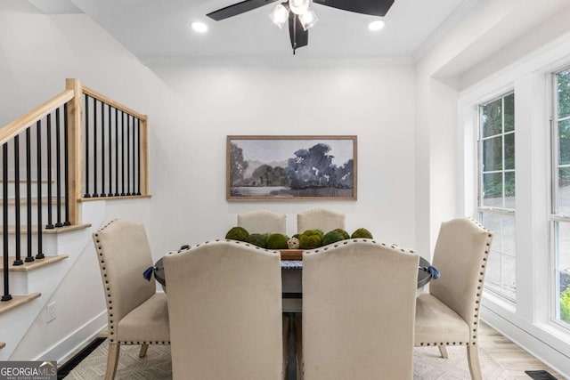 5560 Pilgrim Point Ext, Cumming, GA 30041 - dining room with healthy amount of natural light, ornamental molding, a ceiling fan, wood finished floors, and recessed lighting