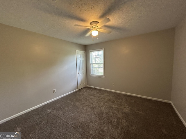 54 Mount Zion Church Rd, Lagrange, GA 30241 - unfurnished room featuring a ceiling fan, dark carpet, and a textured ceiling