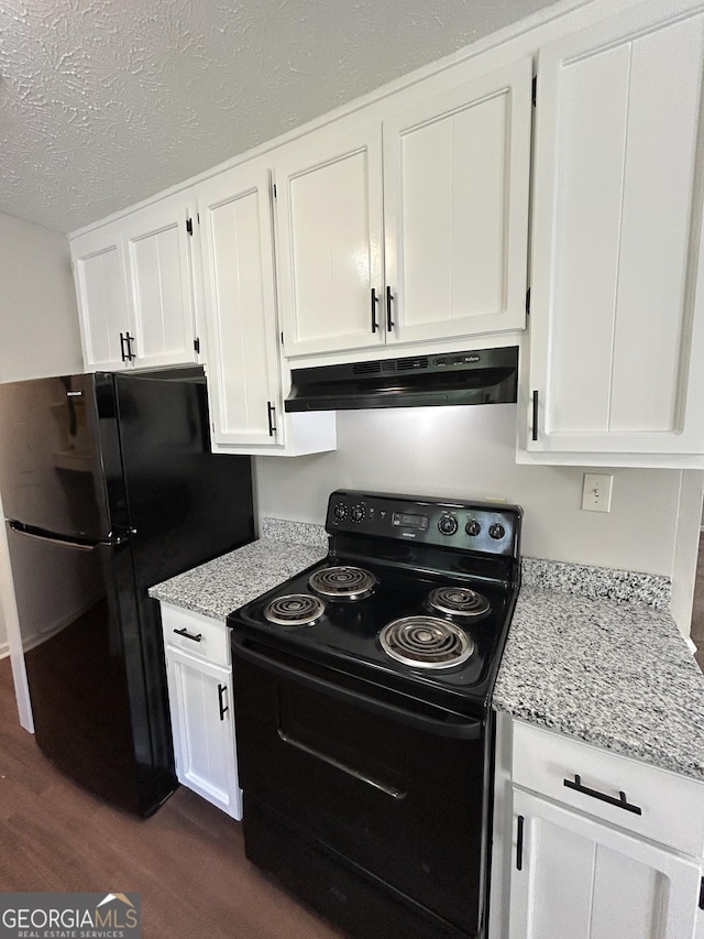54 Mount Zion Church Rd, Lagrange, GA 30241 - kitchen with black appliances, under cabinet range hood, white cabinets, and a textured ceiling