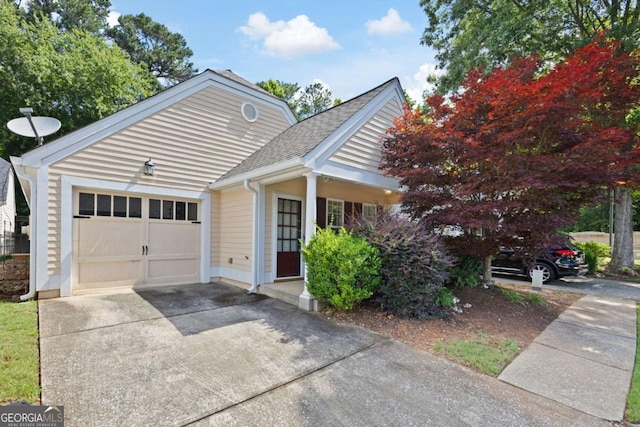 5069 Kathryn Glen Dr, Acworth, GA 30101 - view of front of property with concrete driveway, a garage, and a shingled roof