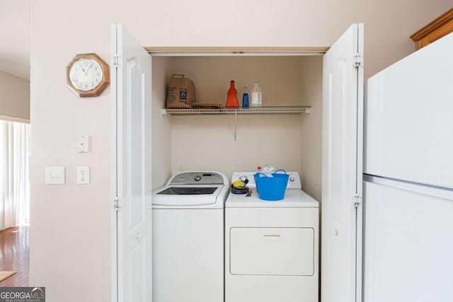 5069 Kathryn Glen Dr, Acworth, GA 30101 - laundry room with washing machine and clothes dryer