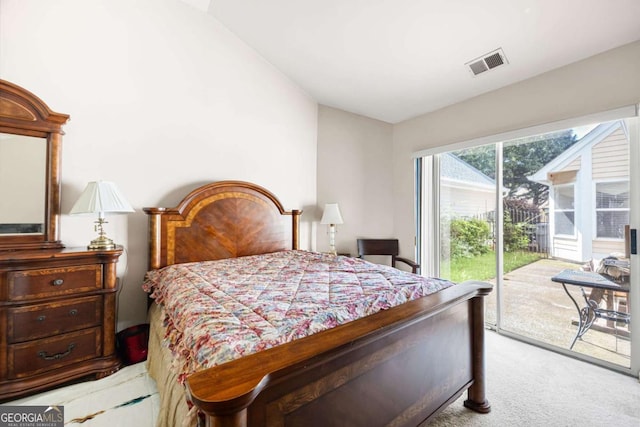 5069 Kathryn Glen Dr, Acworth, GA 30101 - bedroom with access to outside, light colored carpet, and vaulted ceiling