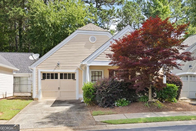 5069 Kathryn Glen Dr, Acworth, GA 30101 - view of front of home with a garage, driveway, and roof with shingles