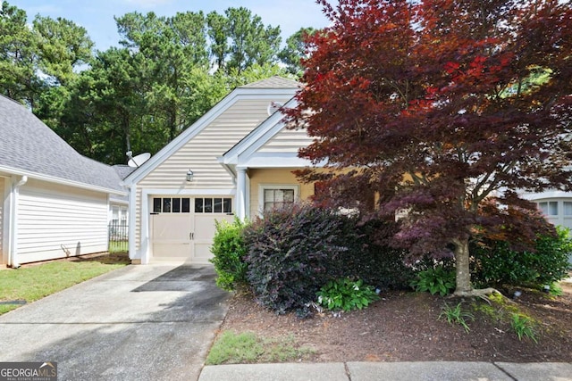 5069 Kathryn Glen Dr, Acworth, GA 30101 - view of front of property with a garage, concrete driveway, and a shingled roof