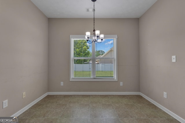 502 Creekside Dr, Lagrange, GA 30240 - empty room featuring a chandelier and baseboards