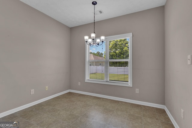 502 Creekside Dr, Lagrange, GA 30240 - spare room with a chandelier and baseboards