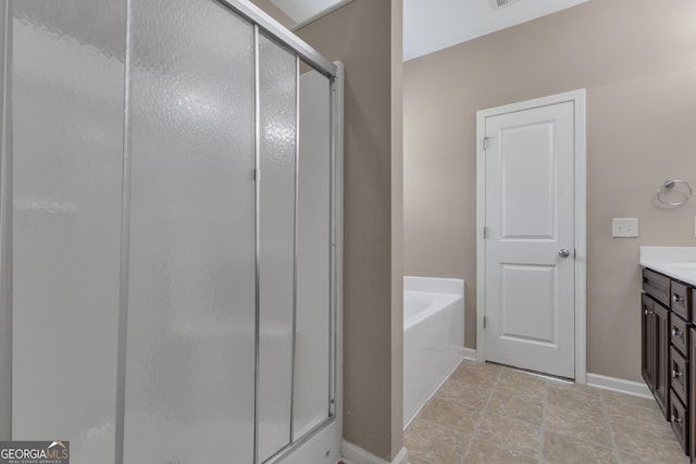 502 Creekside Dr, Lagrange, GA 30240 - bathroom featuring vanity, a stall shower, and a bath
