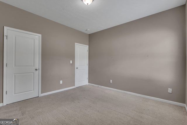 502 Creekside Dr, Lagrange, GA 30240 - unfurnished bedroom with baseboards and carpet floors