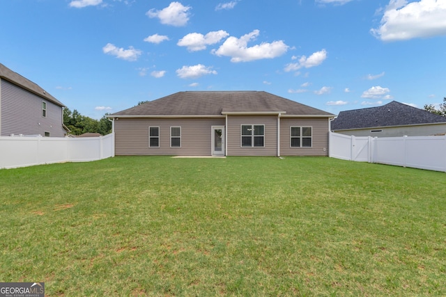 502 Creekside Dr, Lagrange, GA 30240 - rear view of house with a fenced backyard