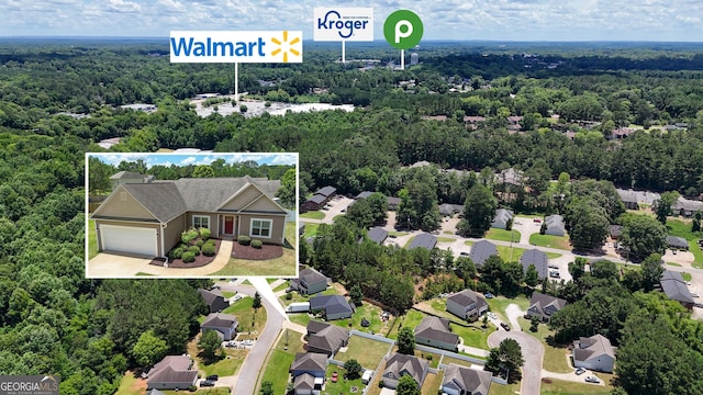 502 Creekside Dr, Lagrange, GA 30240 - aerial view of residential area with a heavily wooded area and property parcel outlined