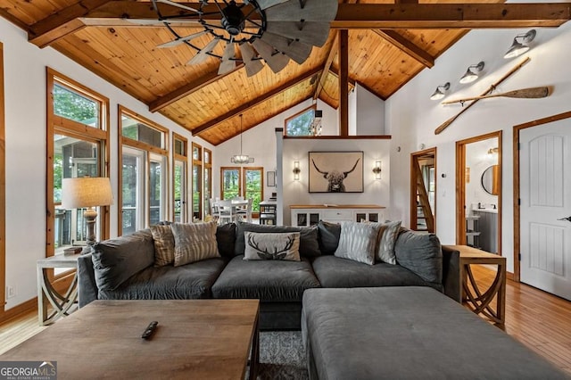 128 Overlake Ct, Morganton, GA 30560 - living area featuring a wood ceiling with exposed beams, wood finished floors, healthy amount of natural light, high vaulted ceiling, and a ceiling fan