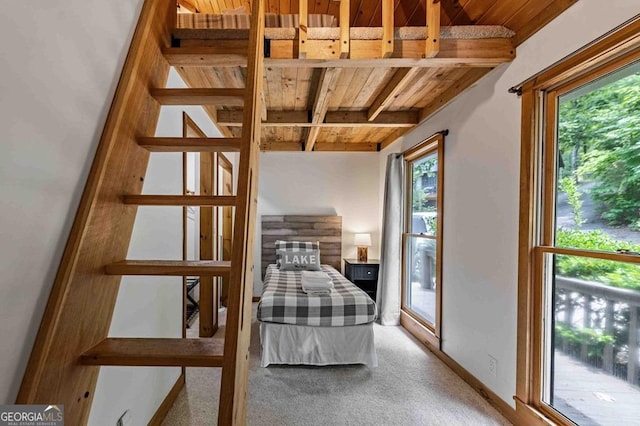 128 Overlake Ct, Morganton, GA 30560 - carpeted bedroom with a wooden ceiling with exposed beams and multiple windows