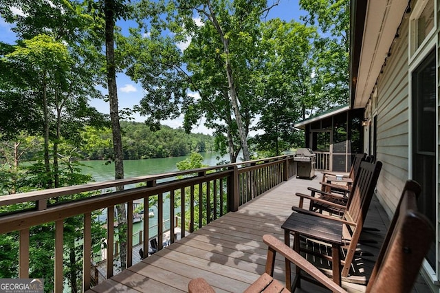 128 Overlake Ct, Morganton, GA 30560 - wooden terrace featuring a water view, view of wooded area, and area for grilling