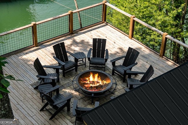 128 Overlake Ct, Morganton, GA 30560 - wooden terrace featuring an outdoor fire pit, a patio area, and a water view