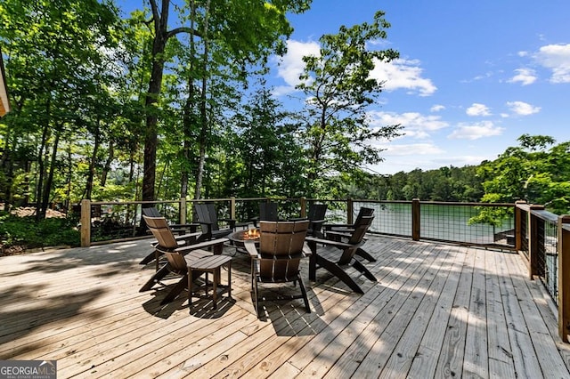 128 Overlake Ct, Morganton, GA 30560 - wooden terrace featuring a fire pit