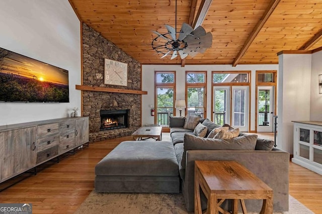 128 Overlake Ct, Morganton, GA 30560 - living room featuring a ceiling fan, wood finished floors, a wood ceiling with exposed beams, high vaulted ceiling, and a stone fireplace