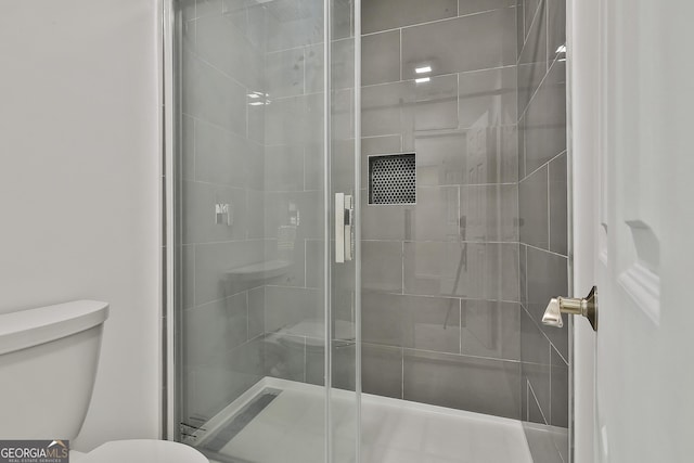 205 Shadowood Ln, Peachtree City, GA 30269 - bathroom featuring toilet and a stall shower