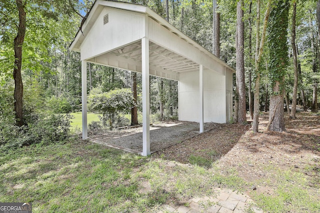 205 Shadowood Ln, Peachtree City, GA 30269 - view of patio featuring a detached carport