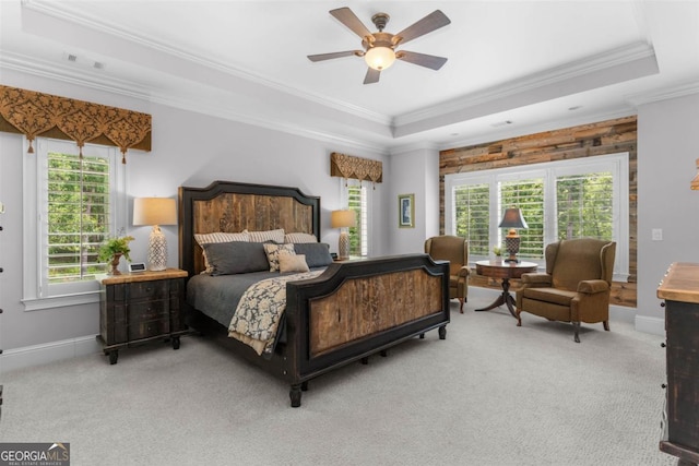 1341 Granite Cove Dr, Greensboro, GA 30642 - carpeted bedroom with crown molding, a raised ceiling, and a ceiling fan