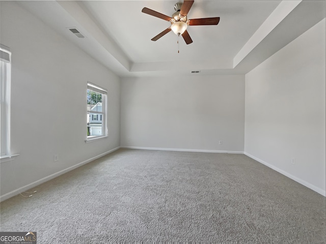 36 Crescent Chase, Dallas, GA 30157 - carpeted spare room with a tray ceiling and a ceiling fan
