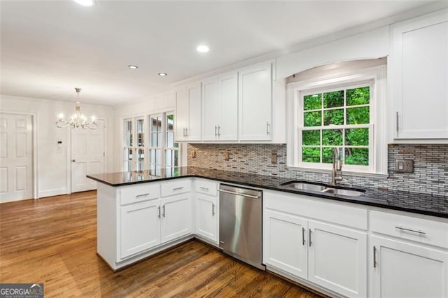 750 Crest Valley Dr NW, Sandy Springs, GA 30327 - kitchen with dishwasher, a peninsula, white cabinets, a chandelier, and recessed lighting