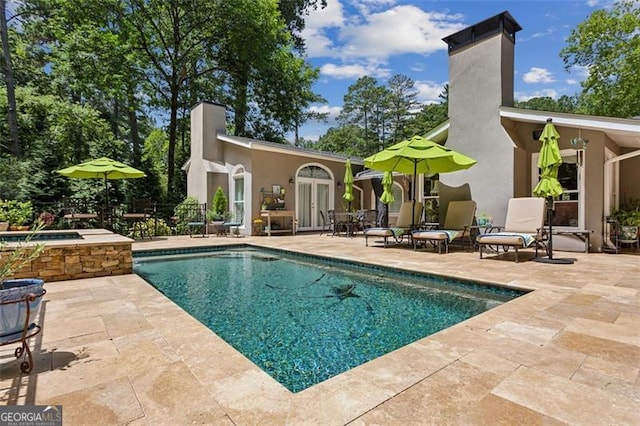 750 Crest Valley Dr NW, Sandy Springs, GA 30327 - swimming pool featuring an in-ground hot tub and a patio area