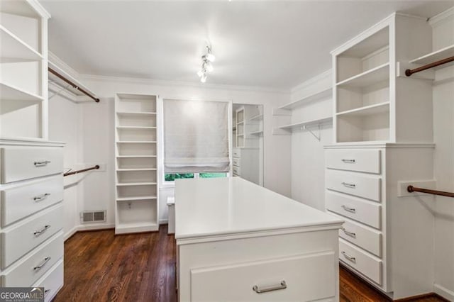 750 Crest Valley Dr NW, Sandy Springs, GA 30327 - spacious closet with dark wood-style floors