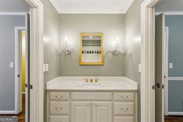 750 Crest Valley Dr NW, Sandy Springs, GA 30327 - bathroom with vanity, wood finished floors, and crown molding