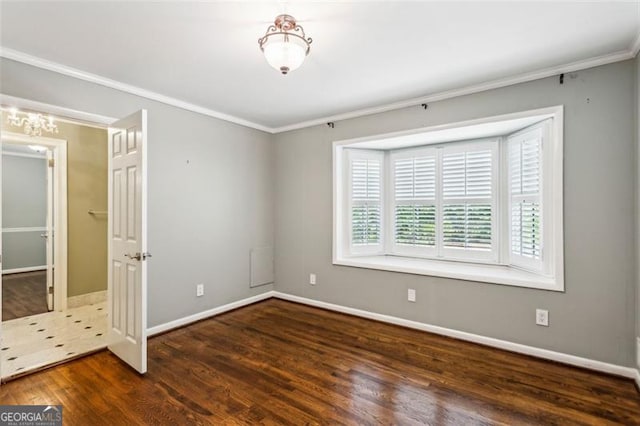 750 Crest Valley Dr NW, Sandy Springs, GA 30327 - unfurnished bedroom featuring wood finished floors and crown molding