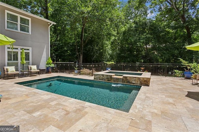 750 Crest Valley Dr NW, Sandy Springs, GA 30327 - view of pool featuring a patio area, view of scattered trees, and a pool with connected hot tub