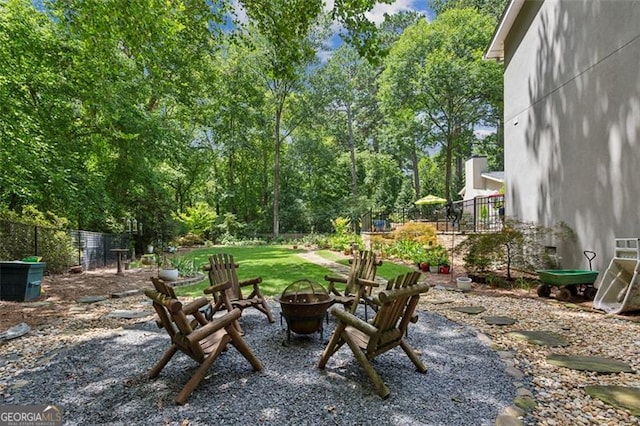 750 Crest Valley Dr NW, Sandy Springs, GA 30327 - view of yard with an outdoor fire pit