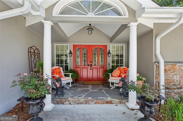 750 Crest Valley Dr NW, Sandy Springs, GA 30327 - entrance to property featuring covered porch and stucco siding