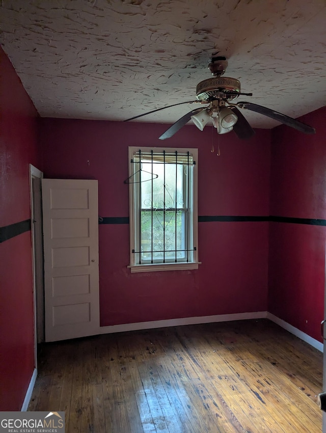 1750 Beechwood Blvd SW, Atlanta, GA 30311 - unfurnished room featuring ceiling fan, hardwood / wood-style flooring, and a textured ceiling