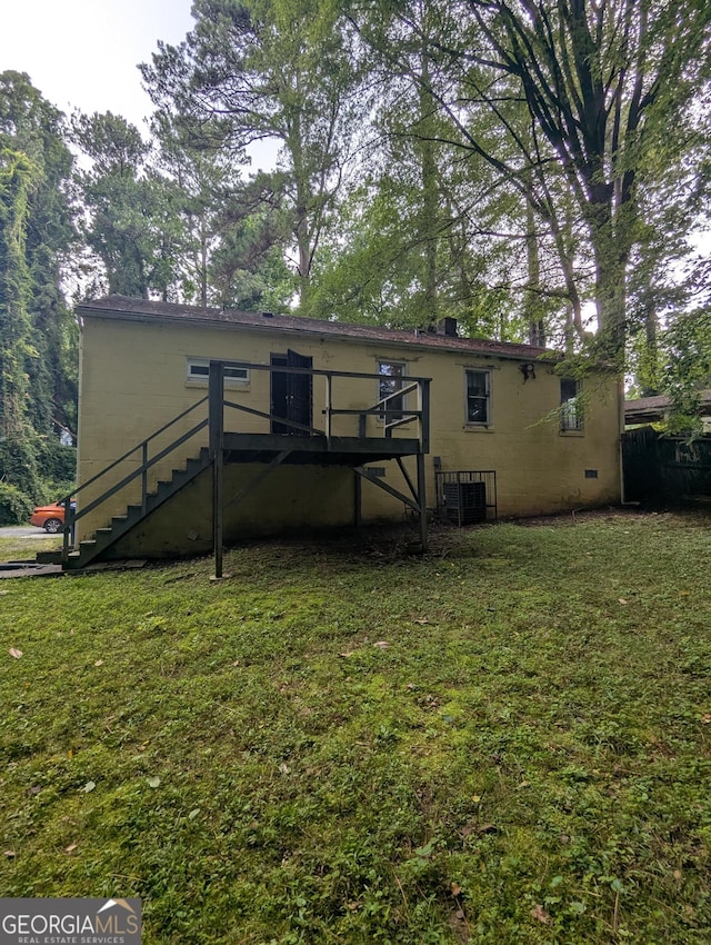 1750 Beechwood Blvd SW, Atlanta, GA 30311 - rear view of property featuring stairs, a lawn, and a deck