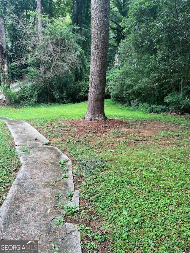 1750 Beechwood Blvd SW, Atlanta, GA 30311 - view of yard with a view of trees