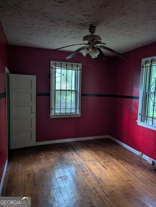 1750 Beechwood Blvd SW, Atlanta, GA 30311 - empty room featuring hardwood / wood-style flooring, a ceiling fan, and a textured ceiling