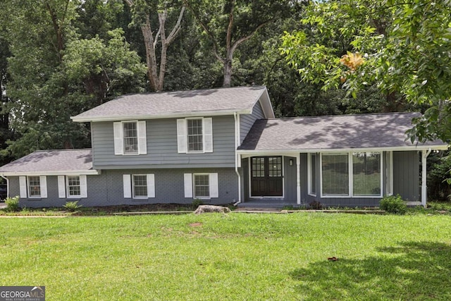 2849 Snapfinger Rd, Decatur, GA 30034 - tri-level home featuring a front lawn, brick siding, and roof with shingles